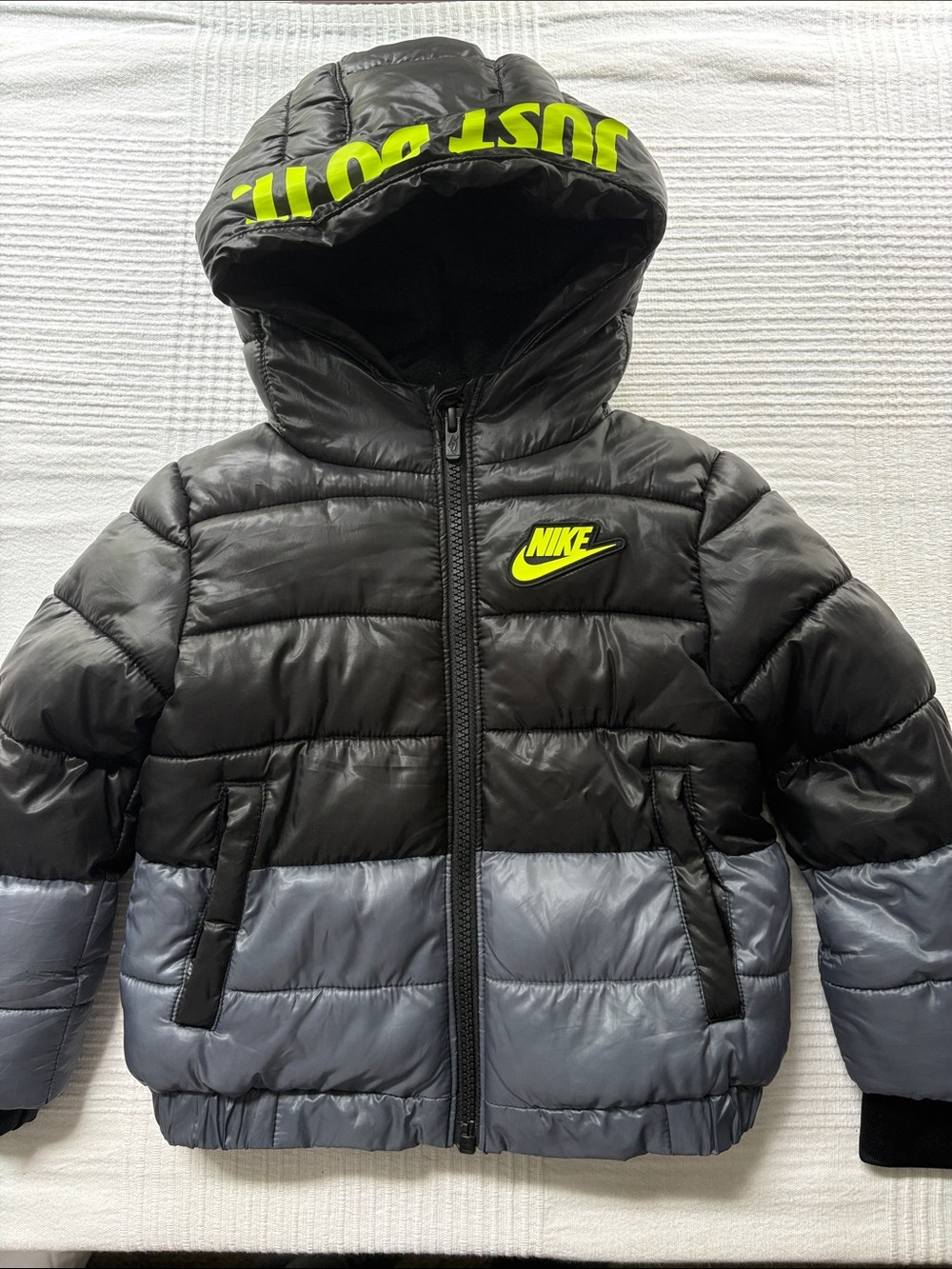 Nike Black and Gray Kids Puffer Jacket with Neon Yellow Logo